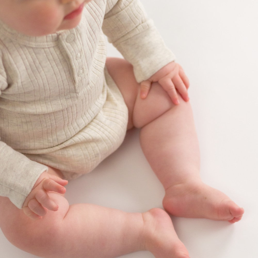 Woolbabe Merino/Organic Cotton Long Sleeve Henley Bodysuit - Natural Marl